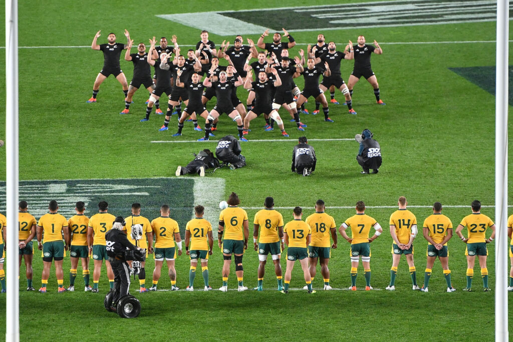 Photo of the All Blacks performing a haka opposite Australia
