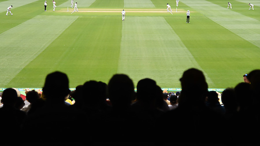 Photo of crowd shadowed in foreground